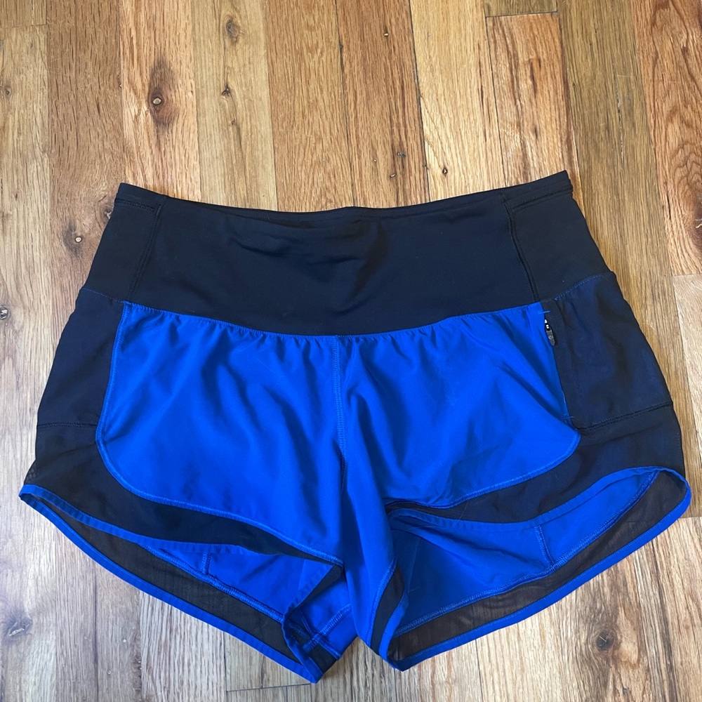 Lululemon Running Shorts with mesh and small pocket| size 4